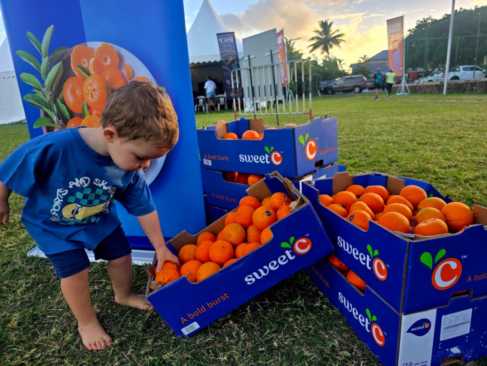 Sweet C branded orange crates at outdoor sports activation